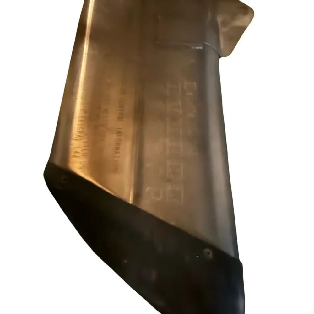 . motorcycle exhaust system, specifically an SC-Project exhaust for an Aprilia